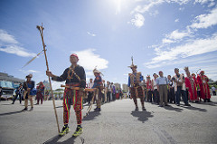 The indigenous representatives standing in the square.