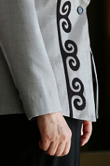 The pattern on the President’s suit.